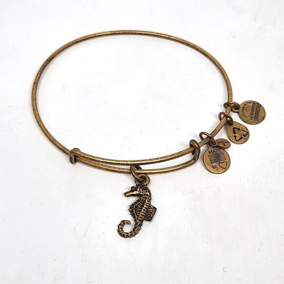 ALEX and ANI Seahorse Gold Tone Bangle Bracelet - Picture 1 of 7